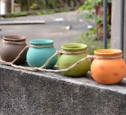 Spieringstore® Plantenhangers - 4 Bloempotjes Aan Een Touw - Hangpotten Voor Binnen En Buiten - Hangpot Schutting - 4 Kleuren Incl. Touw -Bloem Garden Verkoop 1200x1098